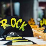 Colorful vinyl records labeled 'Rock' in a vintage music shop, perfect for music enthusiasts.