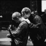 Liam Gallagher Kissing Noel’s Head During a Gig